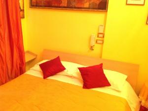 Postel nebo postele na pokoji v ubytování Bed & Breakfast Federico II