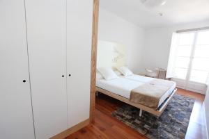 Postel nebo postele na pokoji v ubytování Hotel Pazo de Altamira