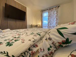Postel nebo postele na pokoji v ubytování Apartmán Vráž u Písku