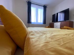 Postel nebo postele na pokoji v ubytování Apartmán Vráž u Písku