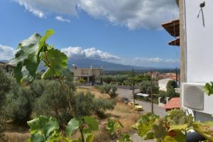 a view of a city from a building at Villa Vitta picola casa in Nafpaktos