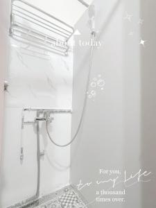 Un baño de 晶城青年旅館