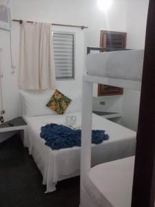 Ένα ή περισσότερα κρεβάτια σε δωμάτιο στο Hotel Pousada Recanto +16 φωτογραφίες