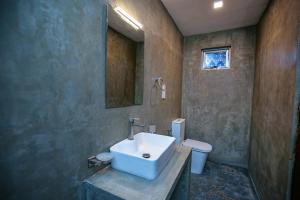 Ένα μπάνιο στο Randika RestRoom