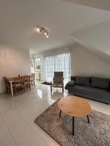 Posezení v ubytování Ferienwohnung- Nußberg