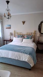 Giường trong phòng chung tại Belle Vue Guesthouse