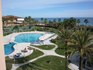 an aerial view of a swimming pool at a resort at Las Américas Islantilla in Islantilla
