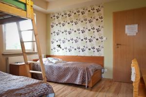 Posteľ alebo postele v izbe v ubytovaní Guest House Wanda