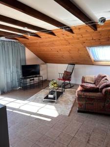 Posezení v ubytování Ferienwohnung in Langenlonsheim