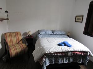 Postel nebo postele na pokoji v ubytování Quarto Suíte Amora