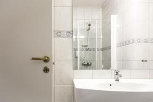 Koupelna v ubytování Quality Hotel Grand Steinkjer