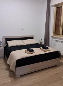 Postel nebo postele na pokoji v ubytování Casa Ferrari
