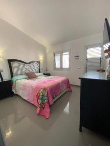 Posteľ alebo postele v izbe v ubytovaní Bungalow frente al mar - Sun Club Playa del Aguila