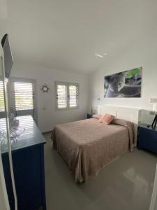 Posteľ alebo postele v izbe v ubytovaní Bungalow frente al mar - Sun Club Playa del Aguila