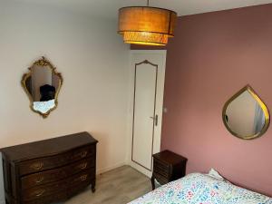 En eller flere senge i et værelse på Maison familiale pour un agréable séjour