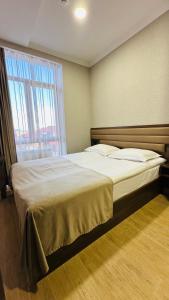 Marrone Hotel Tsaghkadzor客房内的一张或多张床位