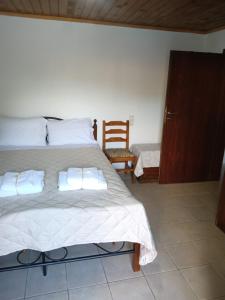 Postel nebo postele na pokoji v ubytování Anilio casa