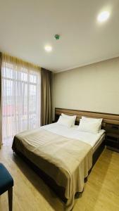 Marrone Hotel Tsaghkadzor客房内的一张或多张床位