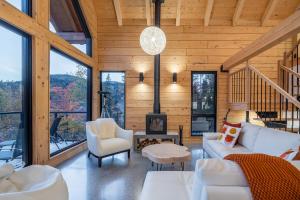 Posezení v ubytování Le Harfång - Vue imprenable - Sauna - 3min du Mont