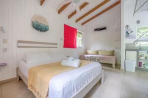 Posteľ alebo postele v izbe v ubytovaní Boho lodge Montezuma l&l