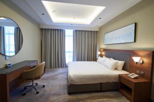 Platinum Hotel客房内的一张或多张床位