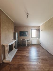 an empty living room with a table and a window at Tenuta il Laureto in Arpino +52 photos