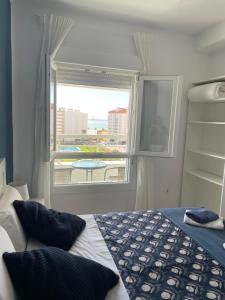 Posteľ alebo postele v izbe v ubytovaní Apartamento playa Valdelagrana + 27 fotografií