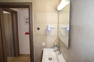 Koupelna v ubytování Seastone Villas + 37 fotografií