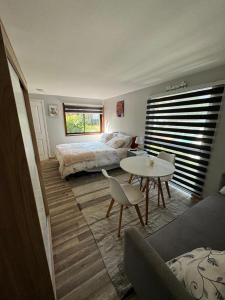 Ένα ή περισσότερα κρεβάτια σε δωμάτιο στο Frente al mar