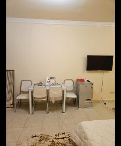 TV in/ali zabaviščno središče v nastanitvi Hostel Erfan