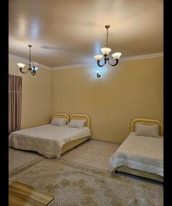 Postel nebo postele na pokoji v ubytování Hostel Erfan