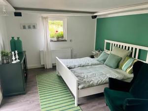 Postel nebo postele na pokoji v ubytování Gästezimmer Seckert Wohlfühlen in der Nähe von MAINZ