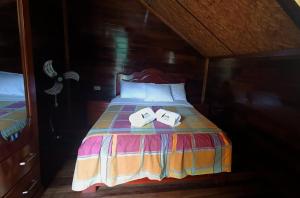 Postel nebo postele na pokoji v ubytování Ecolodge Don Felix