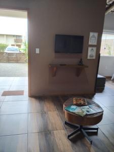 TV a/nebo společenská místnost v ubytování Casa Natturvibe - Praia do Rosa