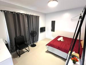 Postel nebo postele na pokoji v ubytování D' Affordable Quarters