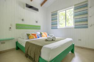Posteľ alebo postele v izbe v ubytovaní Boho lodge Montezuma l&l