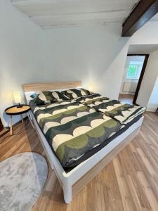 Postel nebo postele na pokoji v ubytování Ferienwohnung in Mixnitz-Bärenschützklamm 2