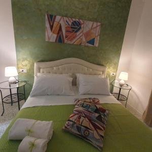Postel nebo postele na pokoji v ubytování B&B La Scalina