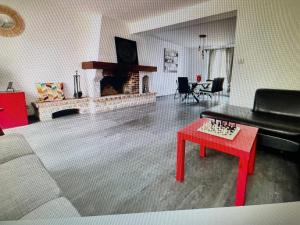 Posezení v ubytování Belle maison à proximité de Château de Versailles avec parking