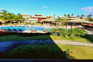 Bazén v ubytování Ykutiba -apt F001 térreo vista parcial mar nebo v jeho okolí