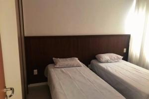 Postel nebo postele na pokoji v ubytování Ykutiba -apt F001 térreo vista parcial mar + 8 fotografií