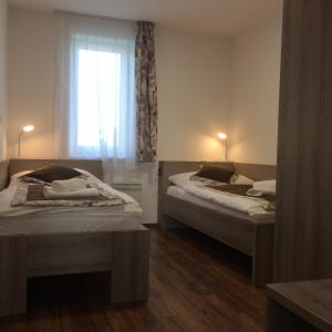 Postel nebo postele na pokoji v ubytování Apollon resort A3