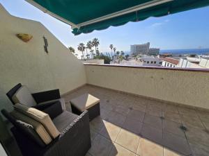 A balcony or terrace at Los Gigantes Amazing Sea view WiFi Pool Parking