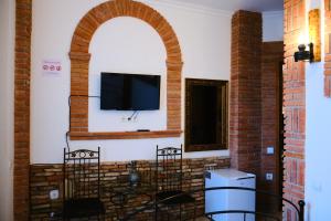 A television and/or entertainment centre at Janashia Boutique Hotels
