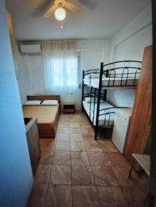 Postel nebo postele na pokoji v ubytování Apartment Mixail 1