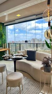 Posezení v ubytování (1305) Studio moderno e aconchegante no Calhau