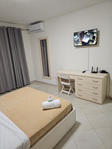 Et tv og/eller underholdning på Apartament Seaview