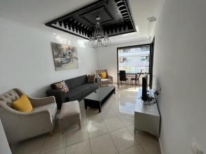 Posezení v ubytování Appartement Cosy Vue sur Mer
