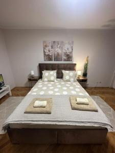 Ένα ή περισσότερα κρεβάτια σε δωμάτιο στο Nadja City Center