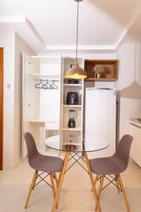 Η κουζίνα ή μικρή κουζίνα στο Flat da Eliete e Admilson 2
